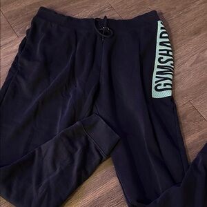 Gymshark Navy Joggers with Teal Logo